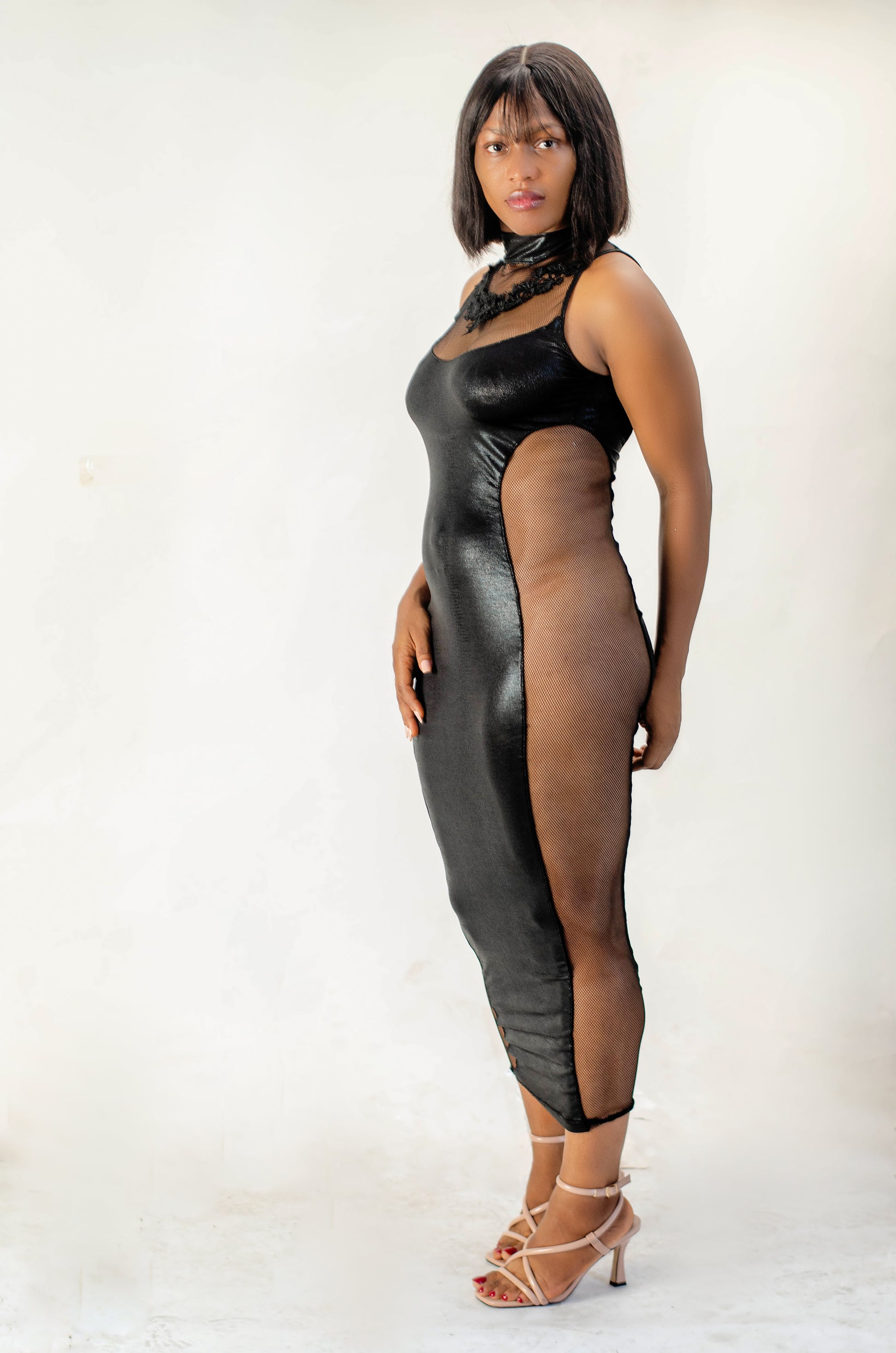 Elegant Black Evening Dress, Mesh Panel Design, High Neck, Open Back, Midi Length
